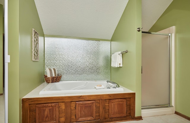 2216 NW 136th St, Clive, IA 50325 - full bath with a stall shower, a garden tub, tile patterned flooring, and a textured ceiling