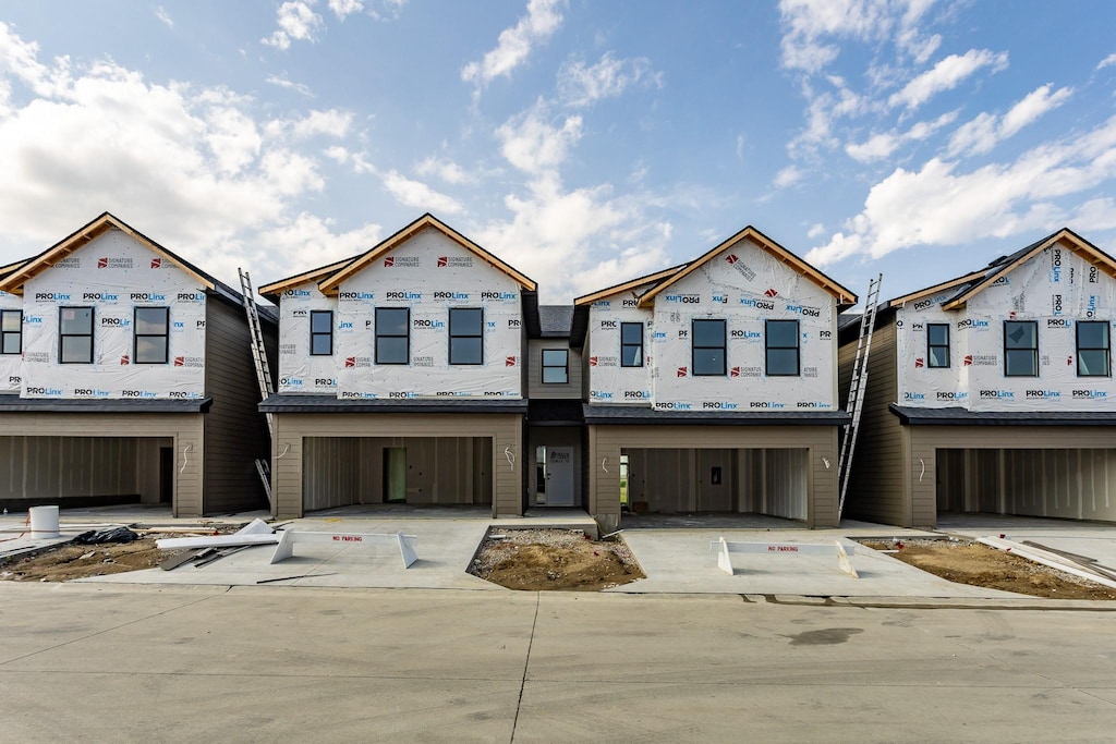 1353 Meadow Rose Pl, Waukee, IA 50263 - property under construction with a garage and driveway