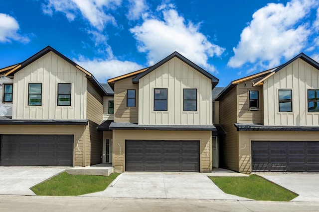 1357 Meadow Rose Pl, Waukee, IA 50263 - townhome / multi-family property featuring board and batten siding, a garage, and concrete driveway