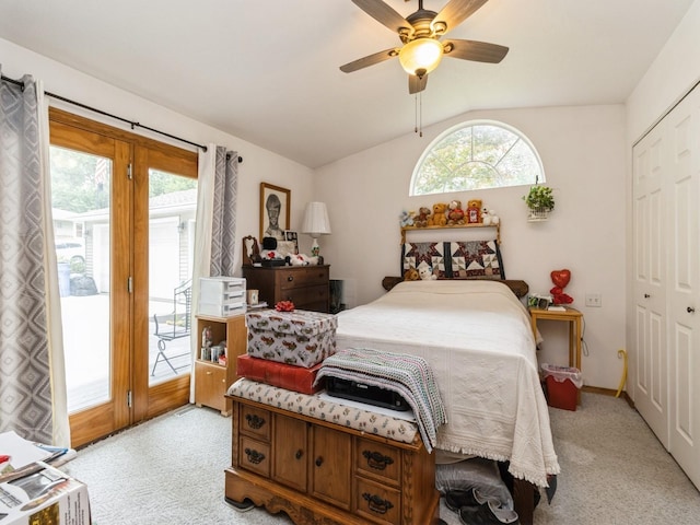 312 N J St, Indianola, IA 50125 - bedroom with light colored carpet, access to outside, vaulted ceiling, a closet, and a ceiling fan