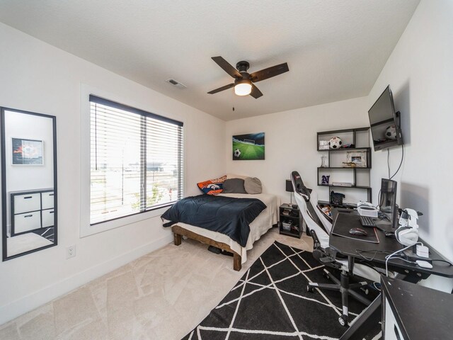 2502 Blooming Heights Dr, Norwalk, IA 50211 - bedroom featuring carpet flooring, a desk, and a ceiling fan