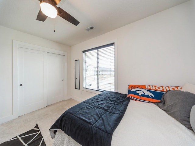 2502 Blooming Heights Dr, Norwalk, IA 50211 - bedroom with light carpet and a ceiling fan
