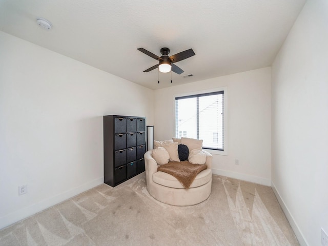 2502 Blooming Heights Dr, Norwalk, IA 50211 - living area featuring carpet floors and a ceiling fan
