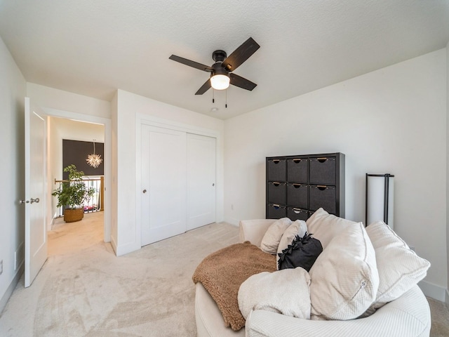 2502 Blooming Heights Dr, Norwalk, IA 50211 - sitting room featuring light colored carpet and a ceiling fan