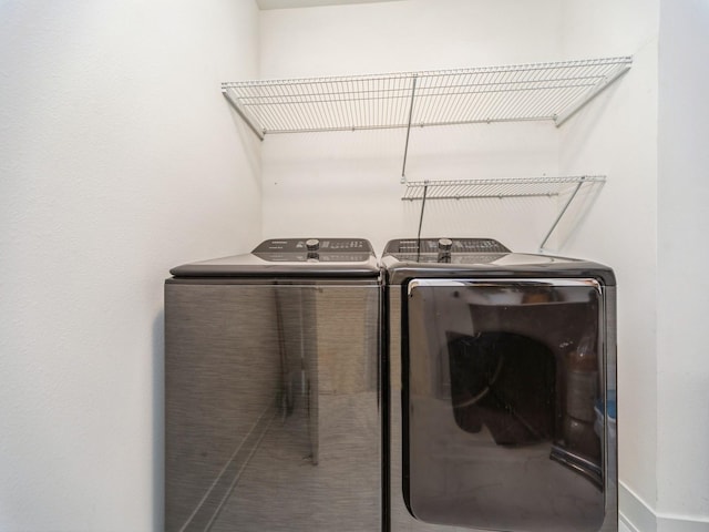 2502 Blooming Heights Dr, Norwalk, IA 50211 - laundry area with washing machine and clothes dryer