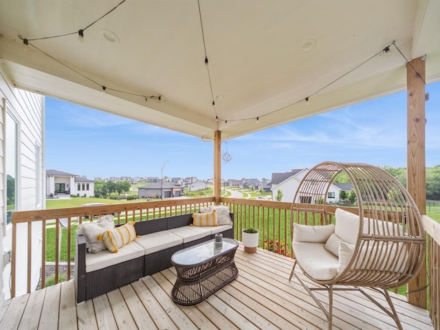 2502 Blooming Heights Dr, Norwalk, IA 50211 - deck with an outdoor living space, a residential view, and a yard