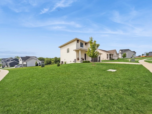 2502 Blooming Heights Dr, Norwalk, IA 50211 - view of front of home featuring a front yard and a residential view