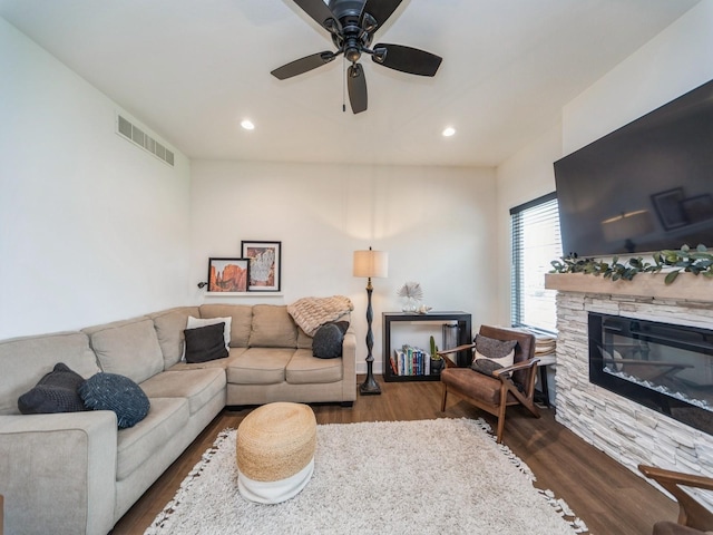 2502 Blooming Heights Dr, Norwalk, IA 50211 - living room with wood finished floors, ceiling fan, recessed lighting, and a fireplace
