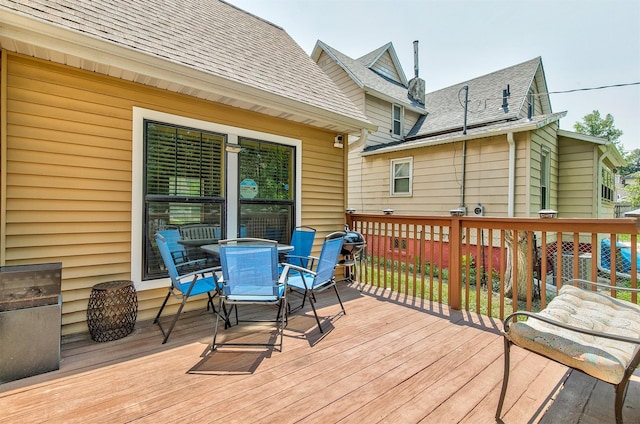 1334 E 13th St, Des Moines, IA 50316 - deck featuring outdoor dining area and grilling area