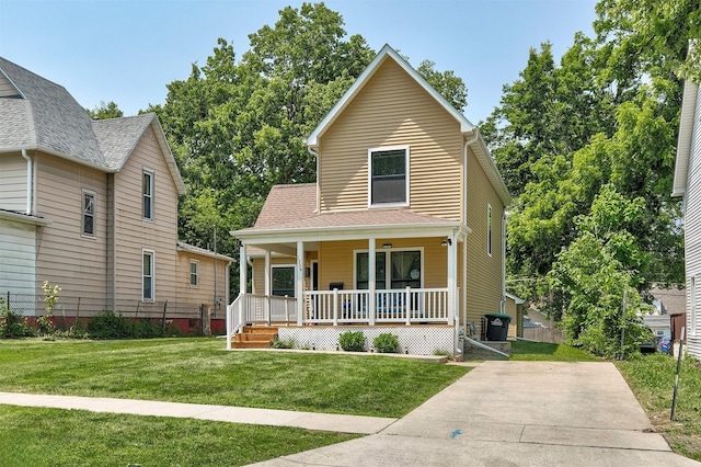 1334 E 13th St, Des Moines, IA 50316 - view of front of house with covered porch and a front lawn