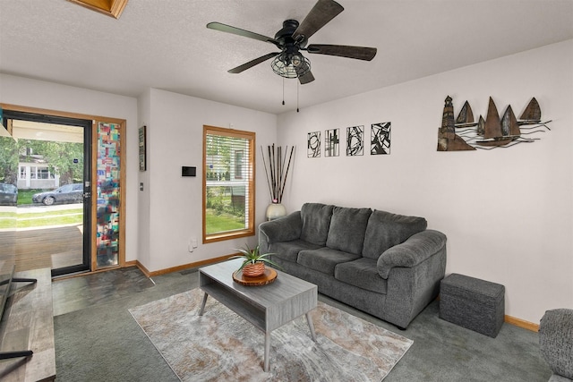 1334 E 13th St, Des Moines, IA 50316 - living room featuring carpet flooring and ceiling fan