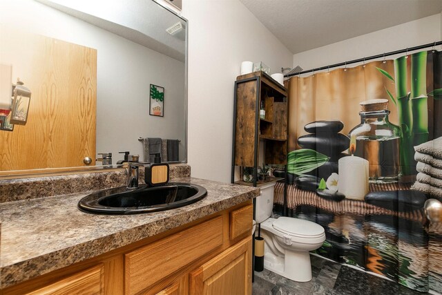 1334 E 13th St, Des Moines, IA 50316 - full bath with vanity, stone finish floors, and curtained shower