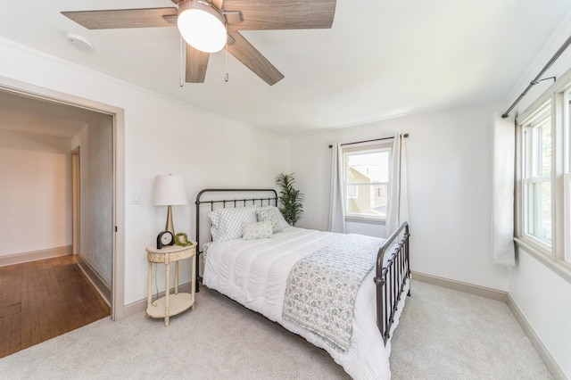 620 48th St, Des Moines, IA 50312 - bedroom with light carpet and ceiling fan