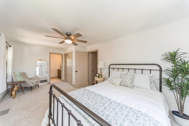 620 48th St, Des Moines, IA 50312 - bedroom featuring light carpet, a ceiling fan, ornamental molding, and arched walkways
