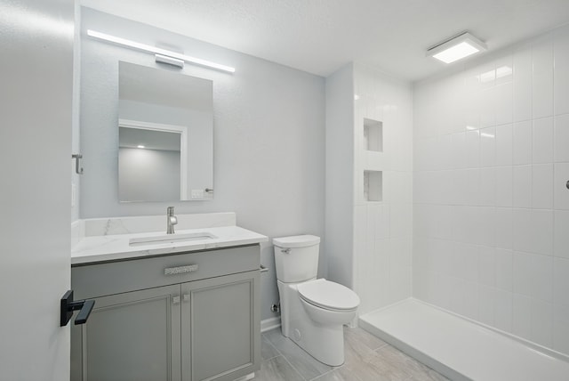 4510 89th St, Urbandale, IA 50322 - bathroom with vanity and a tile shower