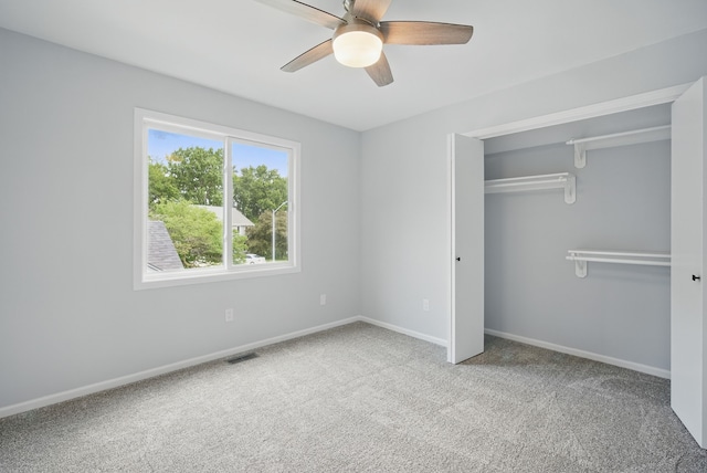 4510 89th St, Urbandale, IA 50322 - unfurnished bedroom with carpet, a closet, and ceiling fan