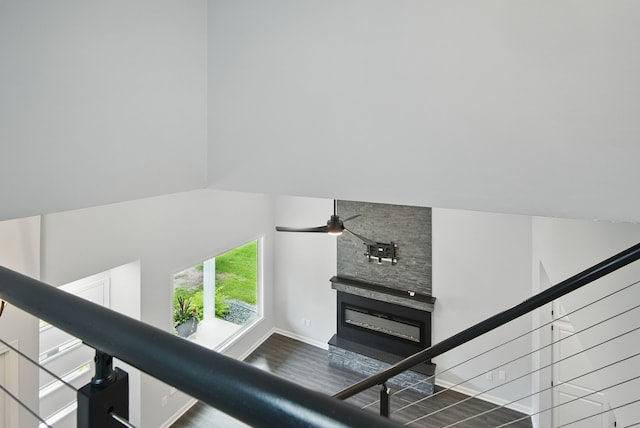 4510 89th St, Urbandale, IA 50322 - stairs featuring wood finished floors and a fireplace