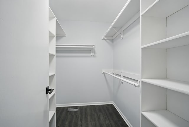 4510 89th St, Urbandale, IA 50322 - walk in closet featuring wood finished floors