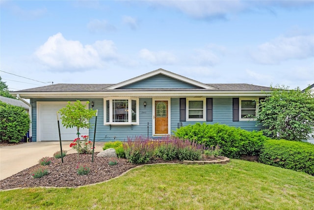 2441 Hull Ave, Des Moines, IA 50317 - single story home featuring an attached garage, concrete driveway, a front yard, and a porch