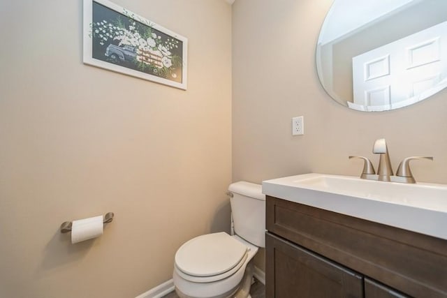 150 SE Hazelwood Dr, Waukee, IA 50263 - bathroom with vanity and toilet