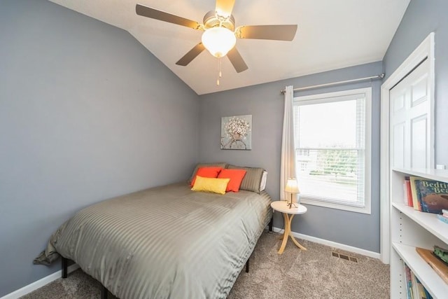 150 SE Hazelwood Dr, Waukee, IA 50263 - carpeted bedroom featuring vaulted ceiling and a ceiling fan