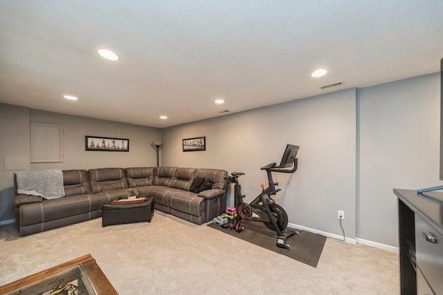 150 SE Hazelwood Dr, Waukee, IA 50263 - carpeted living area featuring baseboards and recessed lighting