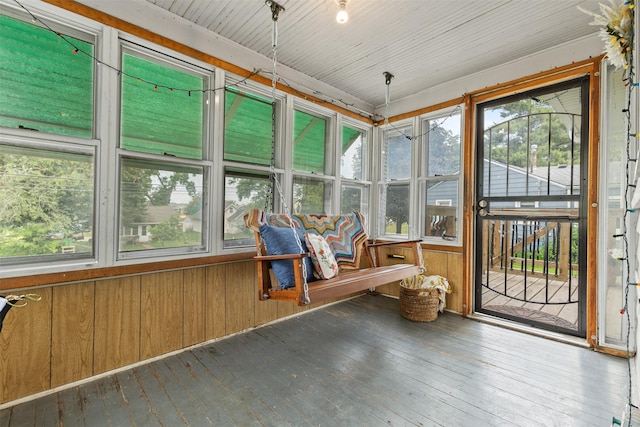 2355 Saylor Rd, Des Moines, IA 50313 - sunroom featuring healthy amount of natural light, hardwood / wood-style flooring, and wood walls
