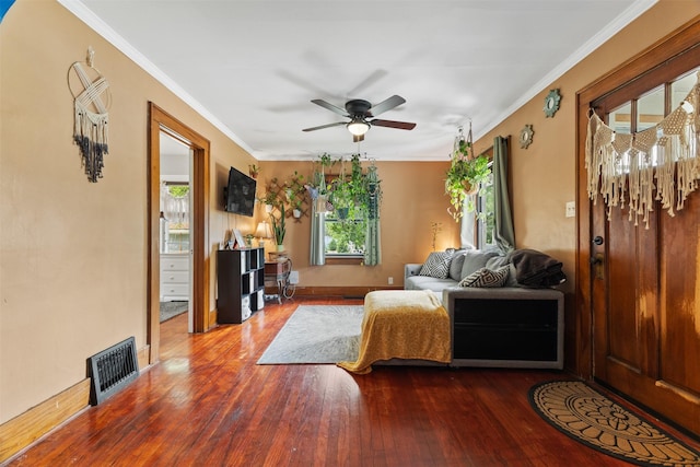 2355 Saylor Rd, Des Moines, IA 50313 - living area featuring ceiling fan, dark wood-type flooring, and ornamental molding