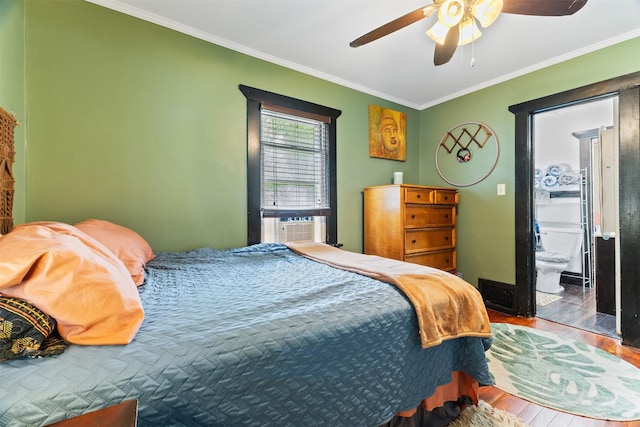 2355 Saylor Rd, Des Moines, IA 50313 - bedroom with wood finished floors, ornamental molding, cooling unit, and ceiling fan