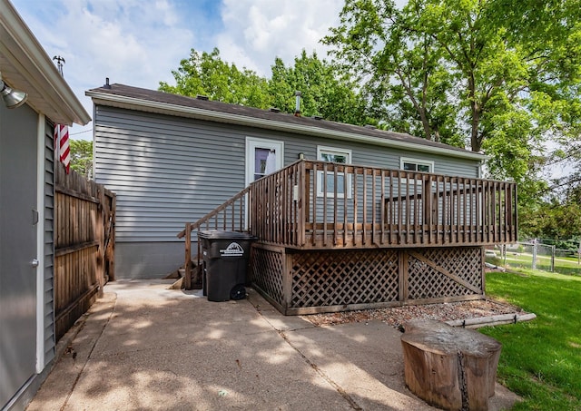 4080 SE 15th Ct, Des Moines, IA 50320 - rear view of house featuring a deck and a patio