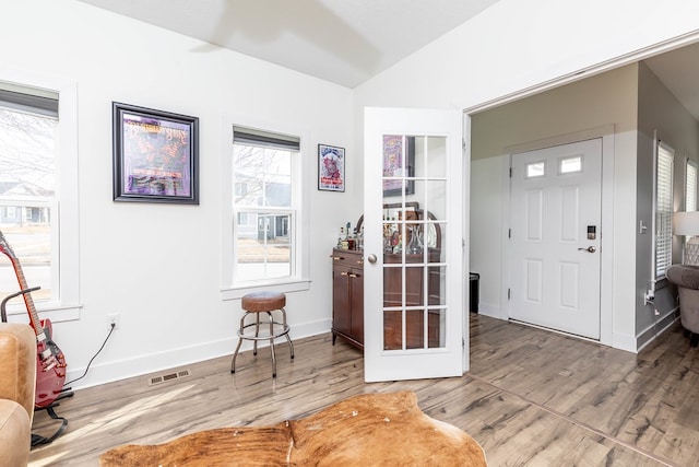 5477 S Prairie View Dr, West Des Moines, IA 50266 - foyer with vaulted ceiling and wood finished floors