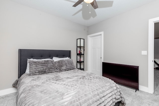 5477 S Prairie View Dr, West Des Moines, IA 50266 - carpeted bedroom featuring a ceiling fan and baseboards