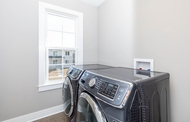 5477 S Prairie View Dr, West Des Moines, IA 50266 - laundry room featuring washing machine and dryer and healthy amount of natural light