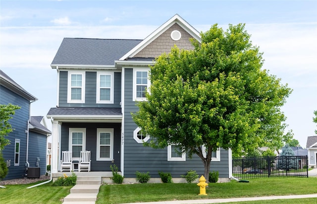 5477 S Prairie View Dr, West Des Moines, IA 50266 - view of front facade featuring a porch and roof with shingles