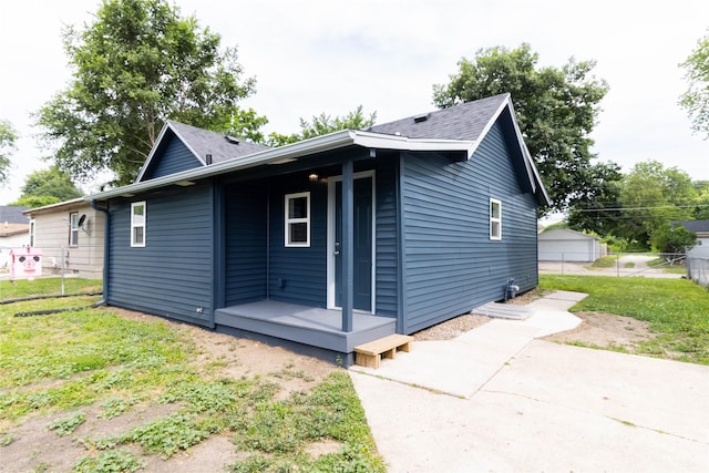 2537 Maple St, Des Moines, IA 50317 - view of home's exterior featuring roof with shingles