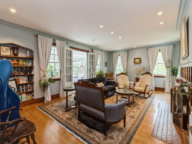215 Foster Dr, Des Moines, IA 50312 - living area with recessed lighting, light wood-type flooring, and crown molding