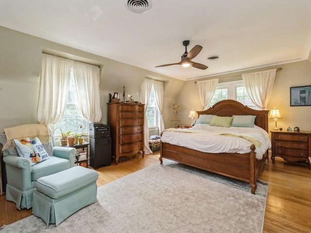 215 Foster Dr, Des Moines, IA 50312 - bedroom with light wood-style flooring and ceiling fan