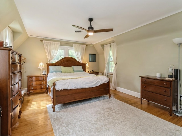 215 Foster Dr, Des Moines, IA 50312 - bedroom with light wood-type flooring, a ceiling fan, and lofted ceiling