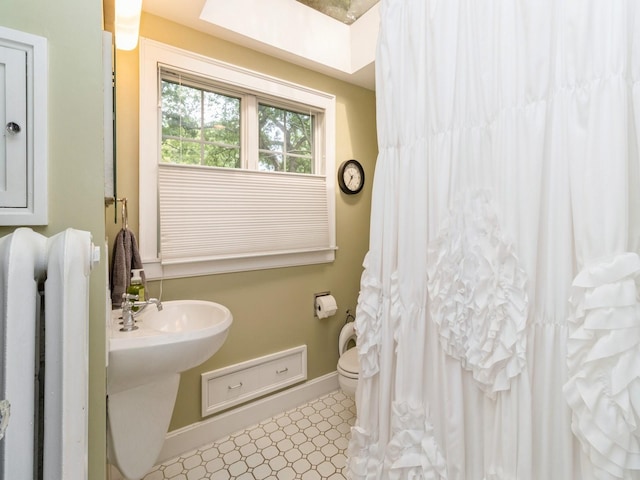215 Foster Dr, Des Moines, IA 50312 - full bathroom with tile patterned floors and a shower with curtain