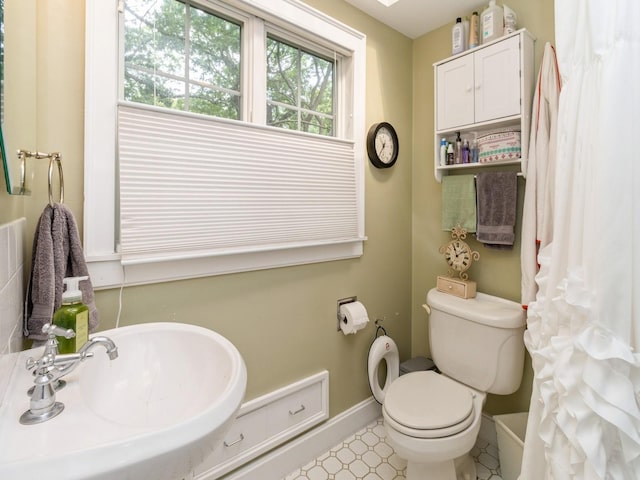 215 Foster Dr, Des Moines, IA 50312 - bathroom with a sink and toilet