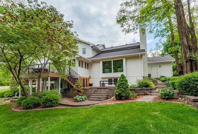 5395 NW 72nd Pl, Johnston, IA 50131 - rear view of property with stairs, a wooden deck, a lawn, and a chimney