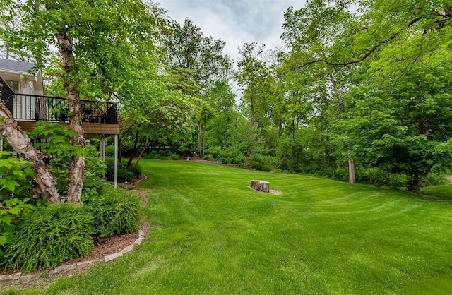 5395 NW 72nd Pl, Johnston, IA 50131 - view of green lawn with a deck