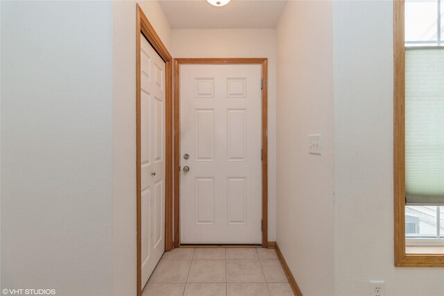 8610 Ep True Pkwy Unit 14002, West Des Moines, IA 50266 - doorway featuring light tile patterned floors and plenty of natural light