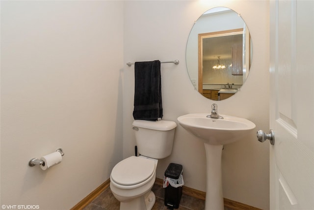 8610 Ep True Pkwy Unit 14002, West Des Moines, IA 50266 - bathroom with toilet and baseboards