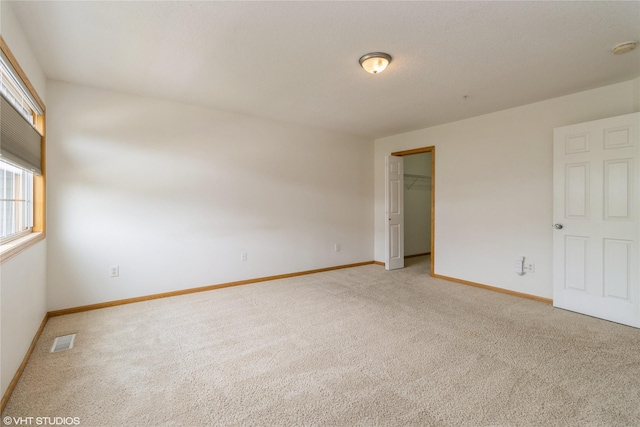 8610 Ep True Pkwy Unit 14002, West Des Moines, IA 50266 - unfurnished room with light colored carpet and a smoke detector