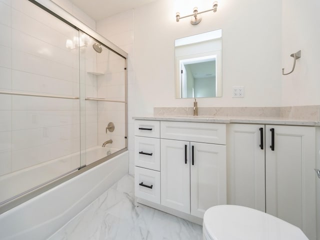 1863 Glen Oaks Dr, West Des Moines, IA 50266 - full bath with marble finish flooring, vanity, and combined bath / shower with glass door