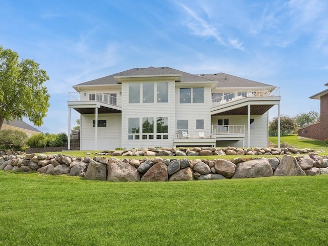 1863 Glen Oaks Dr, West Des Moines, IA 50266 - back of property with a balcony and a lawn