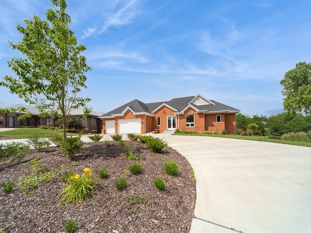 1863 Glen Oaks Dr, West Des Moines, IA 50266 - ranch-style house featuring driveway, a garage, and brick siding