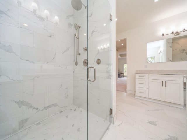 1863 Glen Oaks Dr, West Des Moines, IA 50266 - full bathroom with a marble finish shower, vanity, recessed lighting, and marble finish flooring