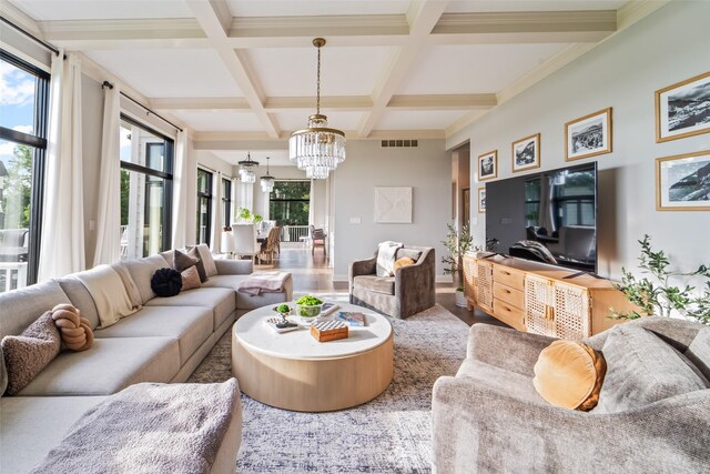 1720 Cedarwood Cir, Clive, IA 50325 - living area featuring a chandelier, coffered ceiling, and beam ceiling